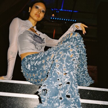 Maque is sitting on stairs