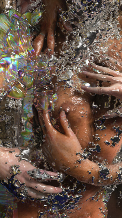 Art photo of a naked breast being touched by hands. It appears to be under water, the liquid shimmers in colour.